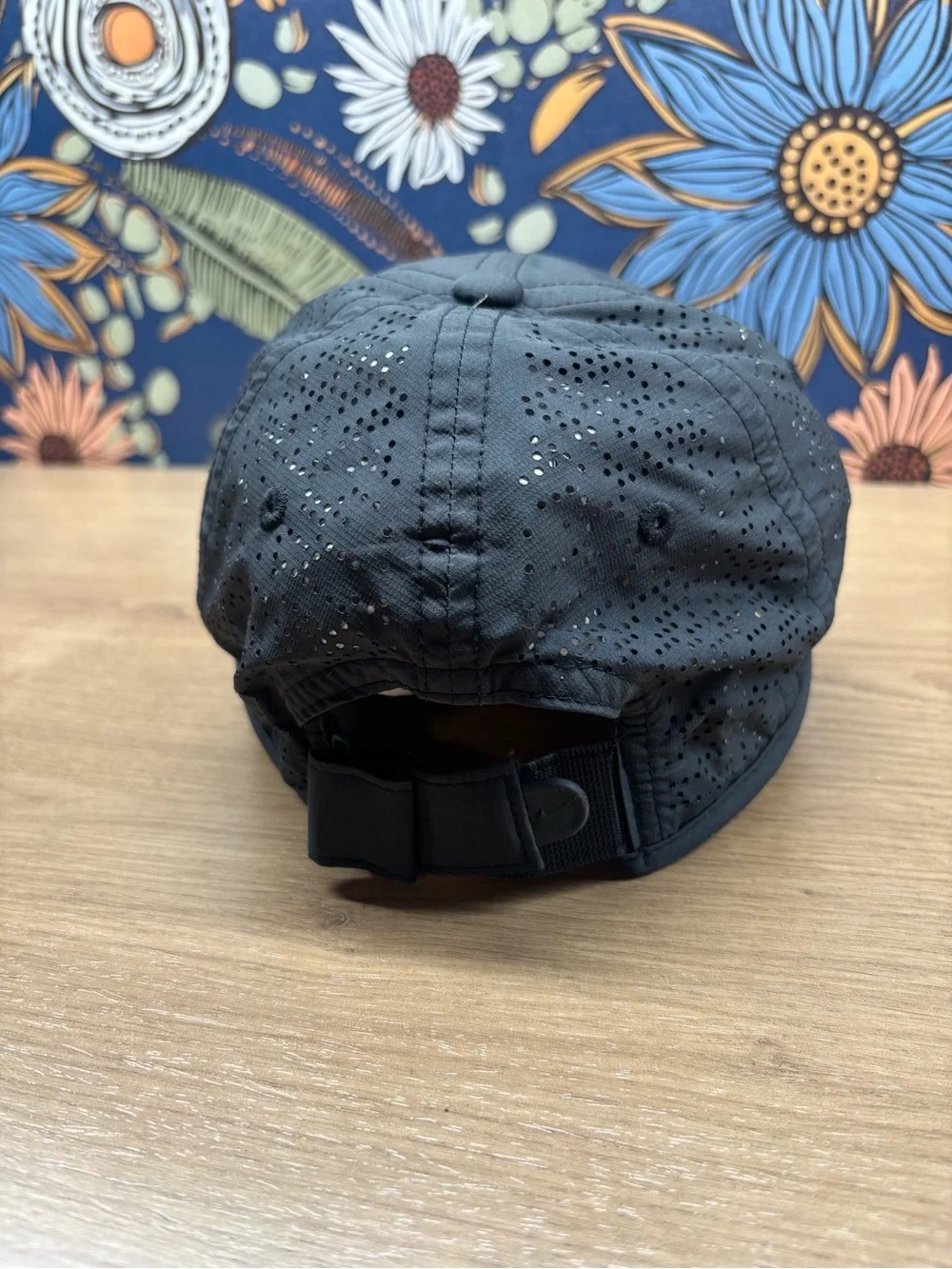 Nike Women's Perdorated Black Cap with White Swoosh
